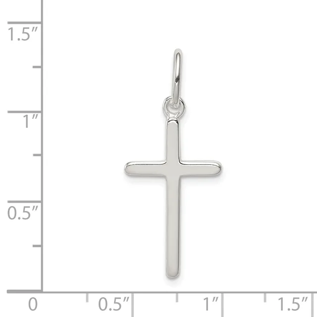 A polished silver cross pendant with rounded edges shown against a measurement scale indicating approximately 1.25 inches in height and 0.75 inches in width.