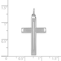 A silver cross pendant with an inner cross design, shown against a ruler measuring approximately one inch wide and one and a quarter inches tall.