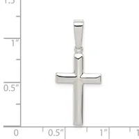 A polished silver cross pendant with a rectangular bail, shown against a measurement scale indicating approximately one inch in height.