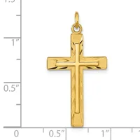 A polished gold cross pendant with a smaller cross design etched into its center, displayed next to a measurement ruler showing it is approximately one inch tall.