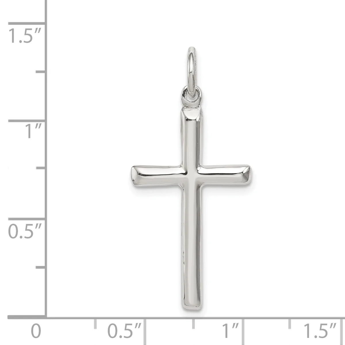 A polished silver cross pendant with a hollow center displayed against a ruler showing it measures approximately one inch wide and one and one-quarter inches tall.