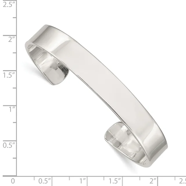 A polished silver cuff bracelet with a curved rectangular form and rounded edges, displayed against a measurement scale showing approximately 2 inches in width.