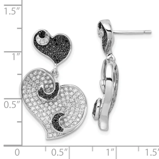 Pair of silver heart-shaped drop earrings with black and white cubic zirconia pavé stones, shown front and side view against a measurement scale.