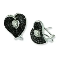 A pair of heart-shaped earrings with black and white pavé-set stones in a silver-tone metal, shown from front and side angles.
