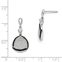 Two silver drop earrings with dome pendants paved with white crystals and outlined in black stones, displayed next to a measurement ruler.