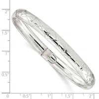 A polished sterling silver bangle bracelet with a diamond-cut pattern, shown next to a ruler indicating it measures approximately 2 inches in height.