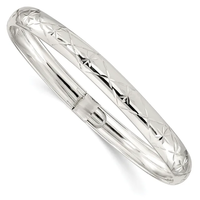 A polished silver bangle bracelet with a quilted diamond pattern etched across the surface and a hinged closure with a small push-lock mechanism.