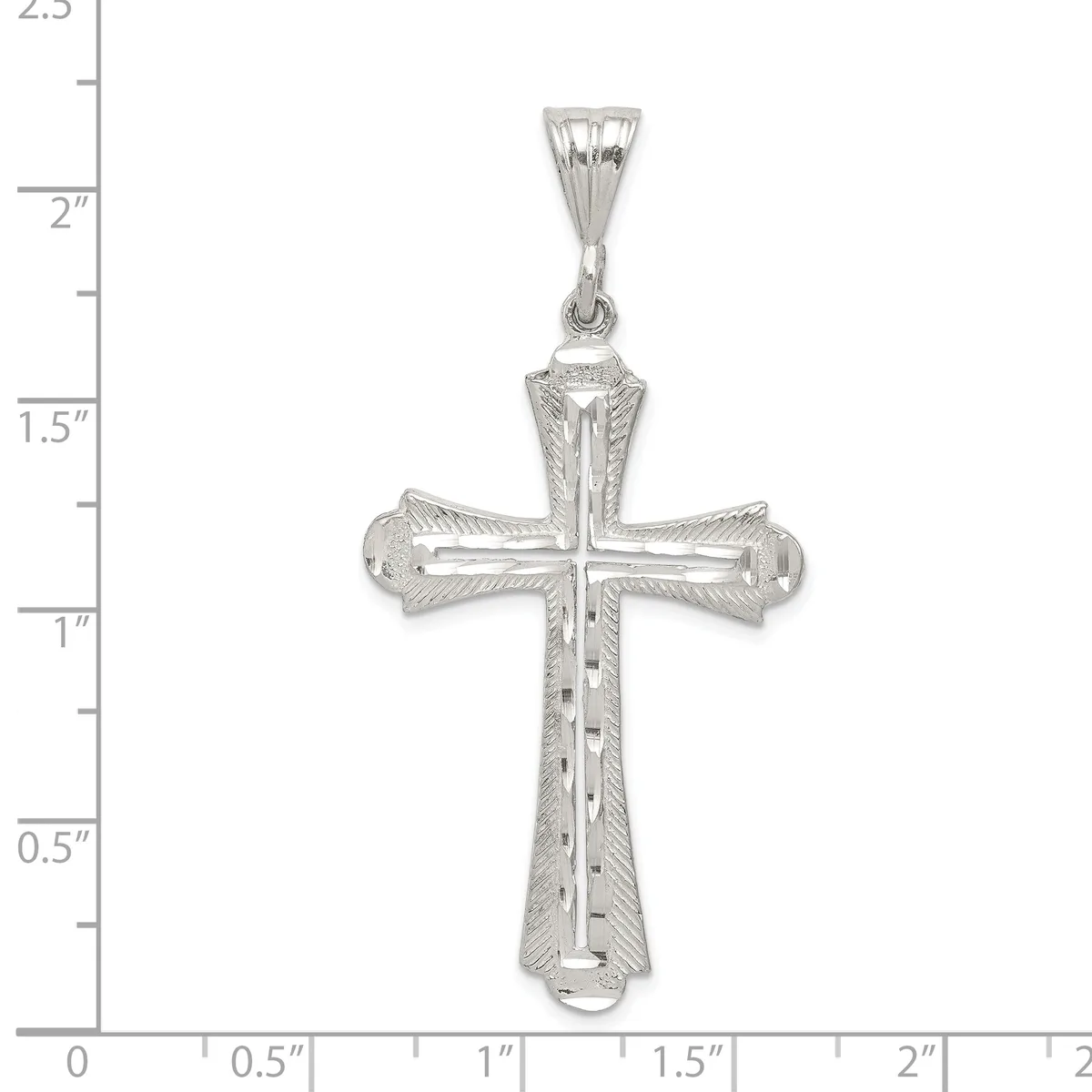 Silver cross pendant with textured surface and hollow ends, shown against a ruler measuring approximately 2 inches in height.