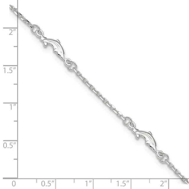 A silver chain bracelet with decorative lobster claw clasps and link details, displayed against a ruler showing approximately 2 inches in length.