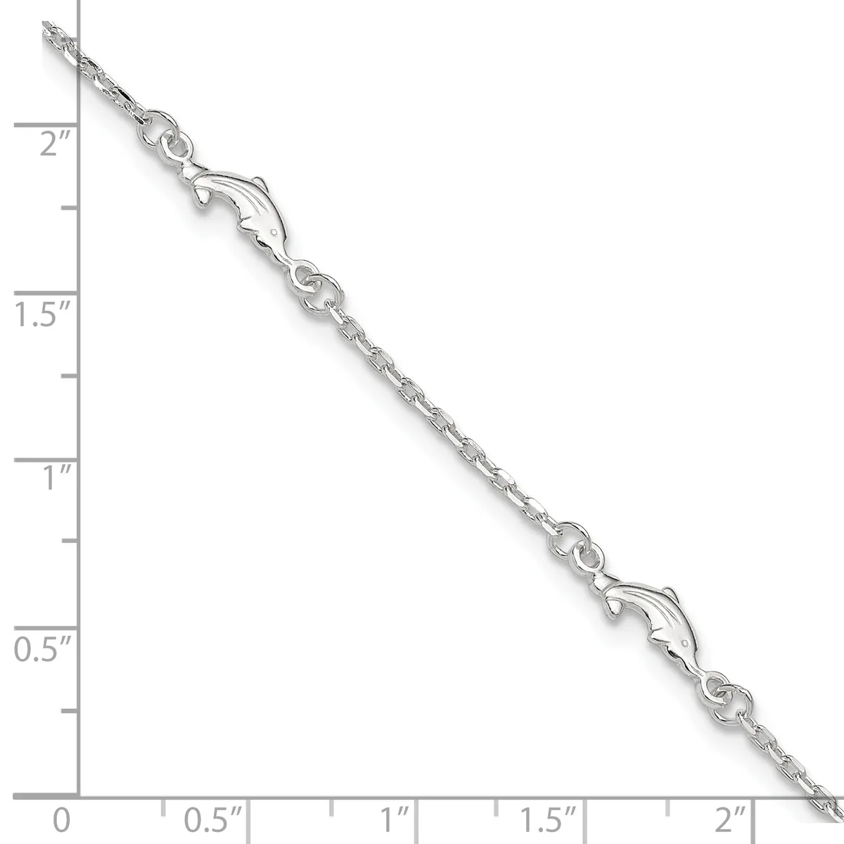 A silver chain bracelet with decorative lobster claw clasps and link details, displayed against a ruler showing approximately 2 inches in length.