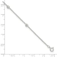 Silver chain bracelet with two bezel-set round diamonds spaced along its length, displayed against a measurement ruler.