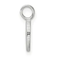 A clear glass magnifying glass with a textured grip handle and small hallmark on the shaft, shown against a white background.