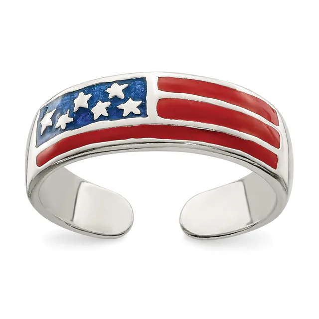 Silver cuff bracelet featuring an enameled American flag design with blue stars and red and white stripes.