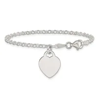Silver-toned bracelet with a rolo chain link design and a heart-shaped charm pendant hanging from a lobster clasp closure.