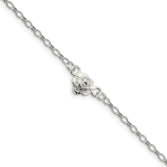 A silver chain bracelet with an oval-shaped charm featuring a detailed owl design centered along the length of the chain.