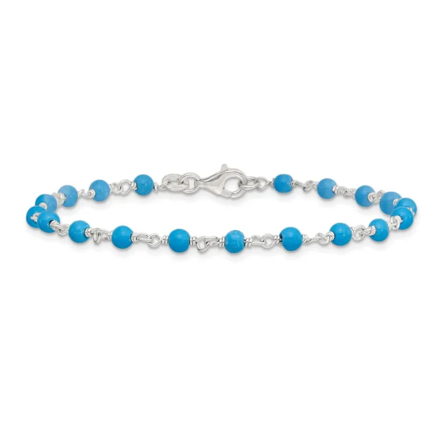 A silver bracelet with turquoise blue beads alternating with small silver spacer beads, featuring a lobster claw clasp.