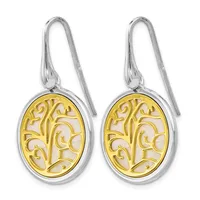 Pair of oval drop earrings with two-tone design featuring gold-colored filigree tree motifs in the center and silver-colored bezels, suspended from silver wire hooks.