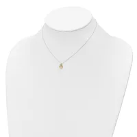 A delicate necklace with a thin silver chain and small gold-toned heart pendant displayed on a white mannequin bust.