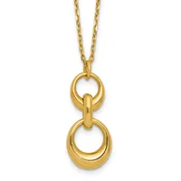 Gold-toned pendant necklace featuring two stacked open oval rings connected by a smaller cylindrical link, suspended from a cable chain.