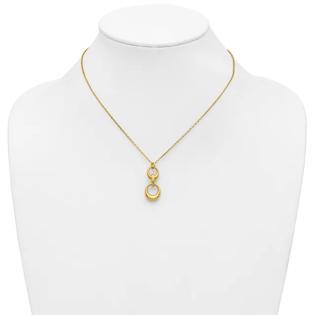 Gold-toned necklace with a delicate chain and a pendant featuring two stacked open circles, displayed on a white mannequin bust.