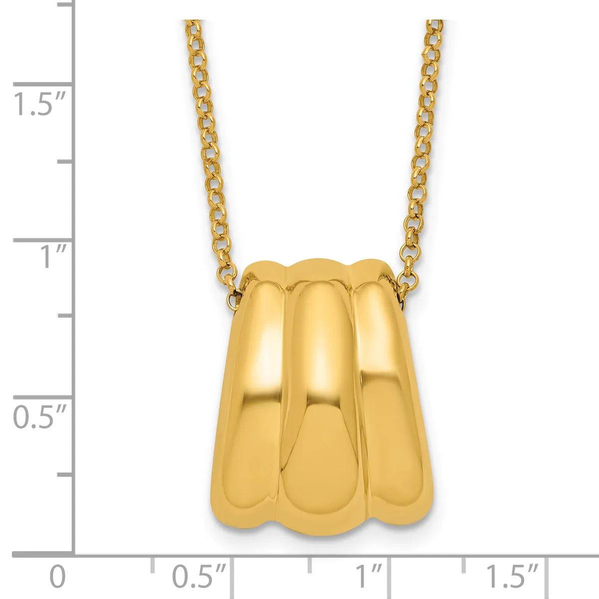 Gold pendant necklace with a scalloped shell-shaped charm hanging from a chain, shown next to a measurement scale indicating approximately one inch in width.