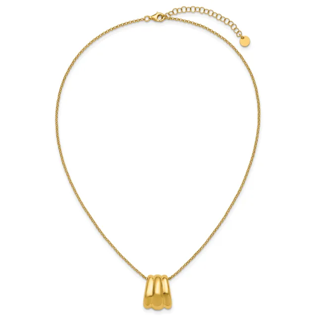 Gold-toned chain necklace with an adjustable length featuring a small textured gold pendant and an extender chain with a disc charm.