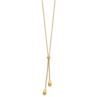 Gold-toned lariat necklace with two small teardrop pendants hanging from adjustable chain ends.