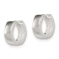 A pair of polished silver hinged hoop earrings with textured inner surfaces, shown from a front three-quarter view against a white background.