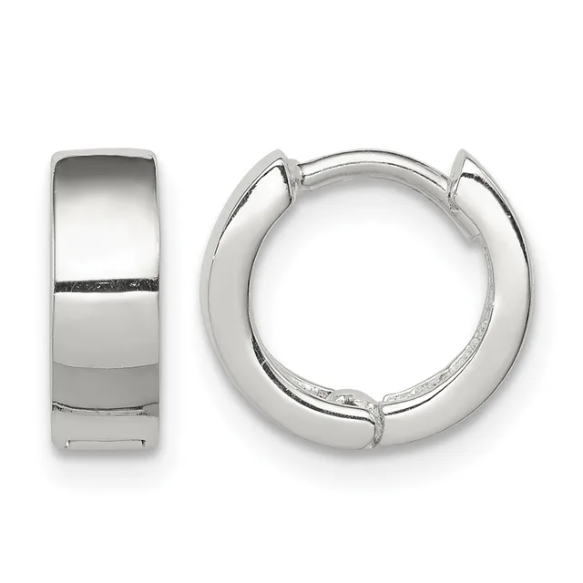 A pair of polished silver huggie hoop earrings shown from front and side views, featuring a chunky curved design with a small hallmark visible on the interior.