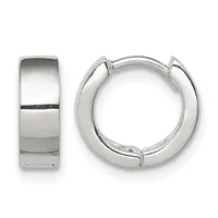 A pair of polished silver huggie hoop earrings shown from front and side views, featuring a chunky curved design with a small hallmark visible on the interior.