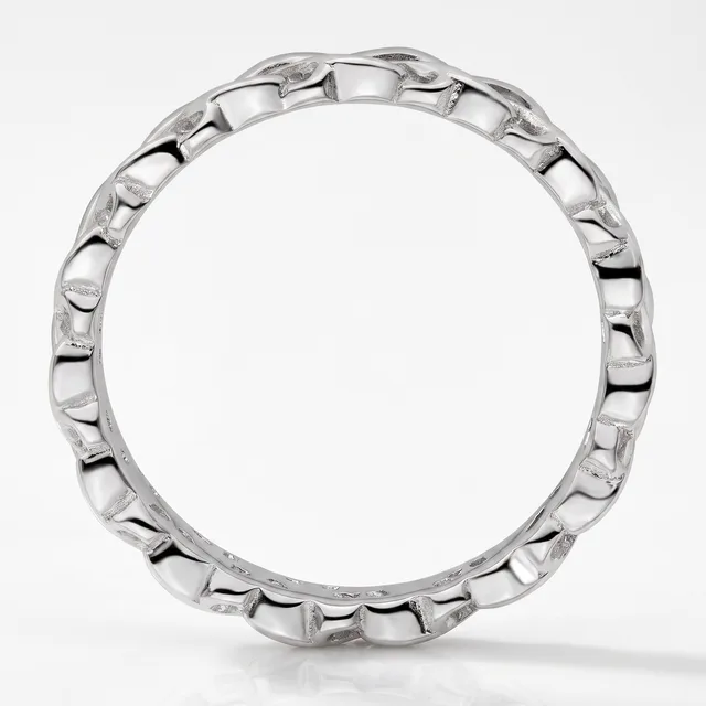 A polished silver ring band with a repeating scalloped or ridged texture around its entire circumference, photographed upright on a white background.