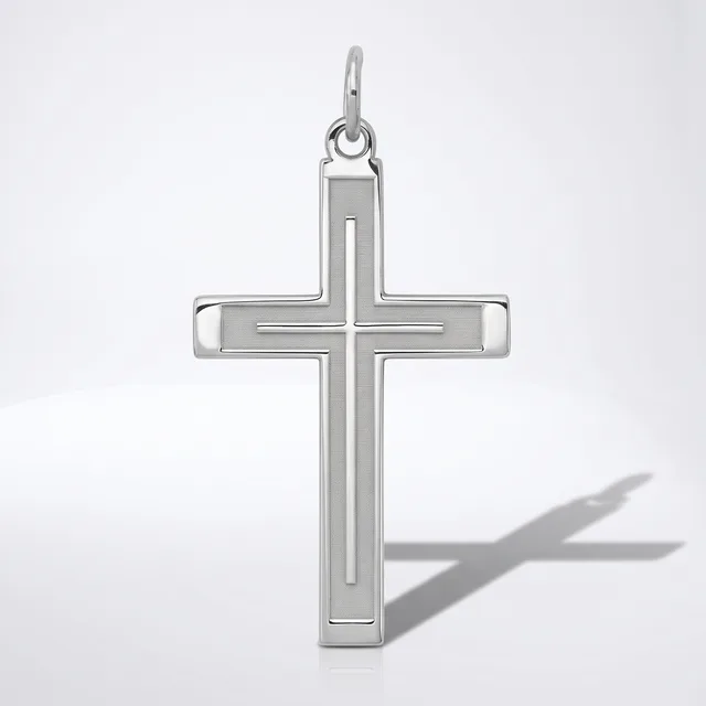Silver cross pendant with a polished finish and beveled edges, shown against a white background with its shadow visible.