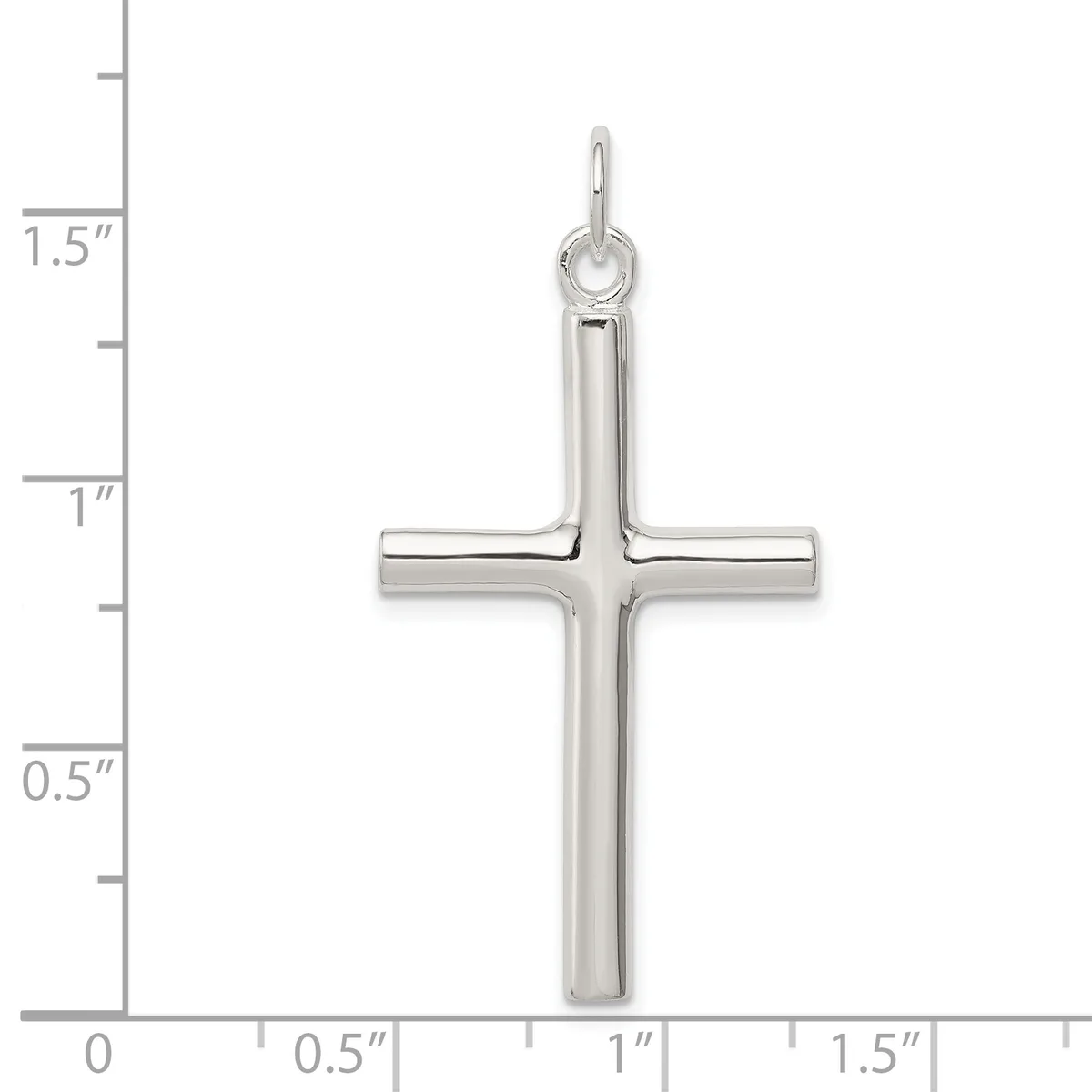 A polished silver cross pendant with a rounded top loop, shown next to a ruler indicating its height is approximately 1.5 inches.