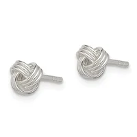 A pair of polished silver knot stud earrings displayed against a white background.