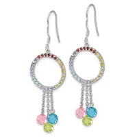 A pair of silver-toned dangle earrings featuring circular rings set with multicolored gemstones in a rainbow gradient, suspended from fish hook wires with dangling faceted stone drops below.