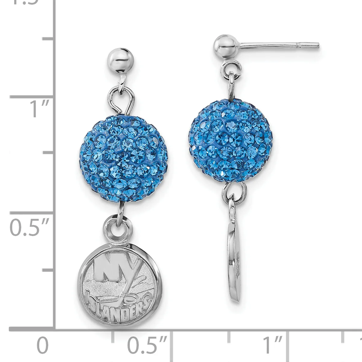 A pair of silver drop earrings with blue crystal-encrusted spheres suspended above small circular medal charms, displayed against a measurement scale.