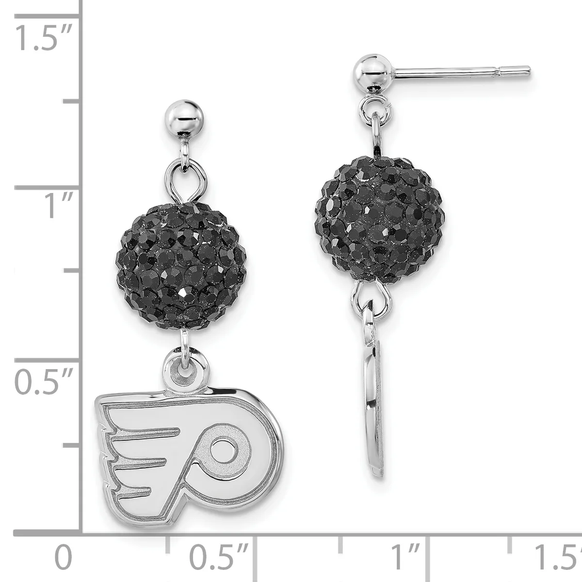 A pair of silver earrings with black crystal ball charms and dangling Philadelphia Flyers logos, displayed against a measurement scale.