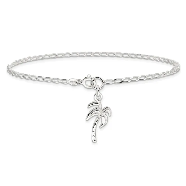 Silver-toned chain bracelet with a circular clasp and a dangling palm tree charm featuring decorative dots along the trunk.