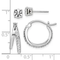 Two pairs of sterling silver earrings displayed on a measurement scale: stud earrings with round faceted stones and hoop earrings with crystal accents along the inner edge.