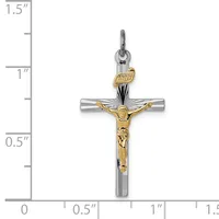 Two-tone crucifix pendant with silver cross and gold-toned corpus, shown next to ruler indicating approximately 1.25 inches in height.