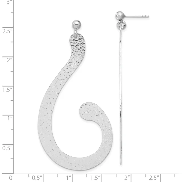Two silver hook earrings with textured surfaces displayed against a measurement scale, one curved hook-shaped and one straight with a chain detail.