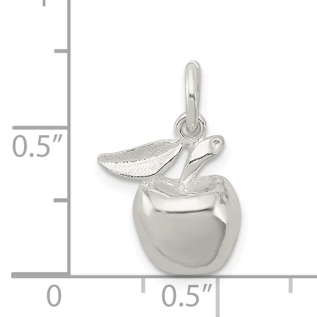 A silver apple charm with a leaf attached, shown next to a ruler indicating approximately half an inch in height.