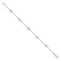 Silver-tone bracelet with five circular crystal or rhinestone stations evenly spaced along a delicate chain, with small loop closures at each end.