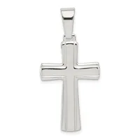 A polished silver cross pendant with a rectangular bail at the top, featuring a grooved vertical center line and beveled edges on the arms.