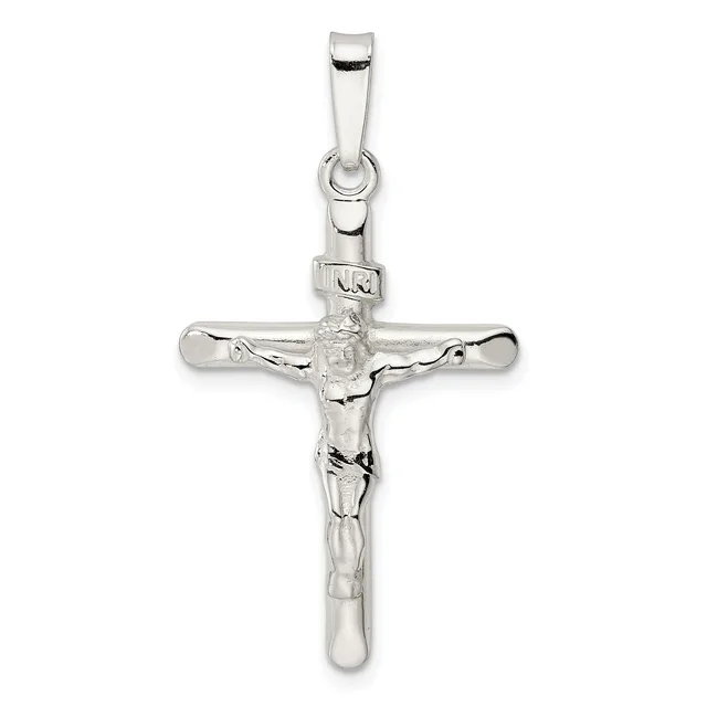 A silver crucifix pendant with a polished finish, featuring a detailed corpus figure, suspended from a rectangular bail.