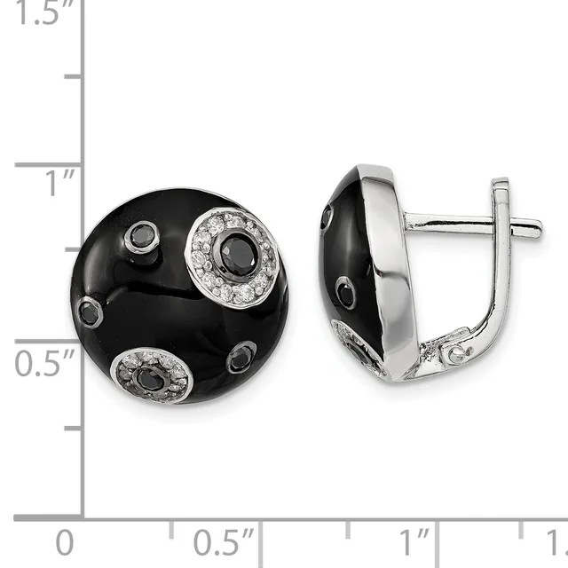 A pair of black onyx and silver earrings with diamond accents, shown from front and side views next to a measurement ruler indicating approximately one inch in diameter.