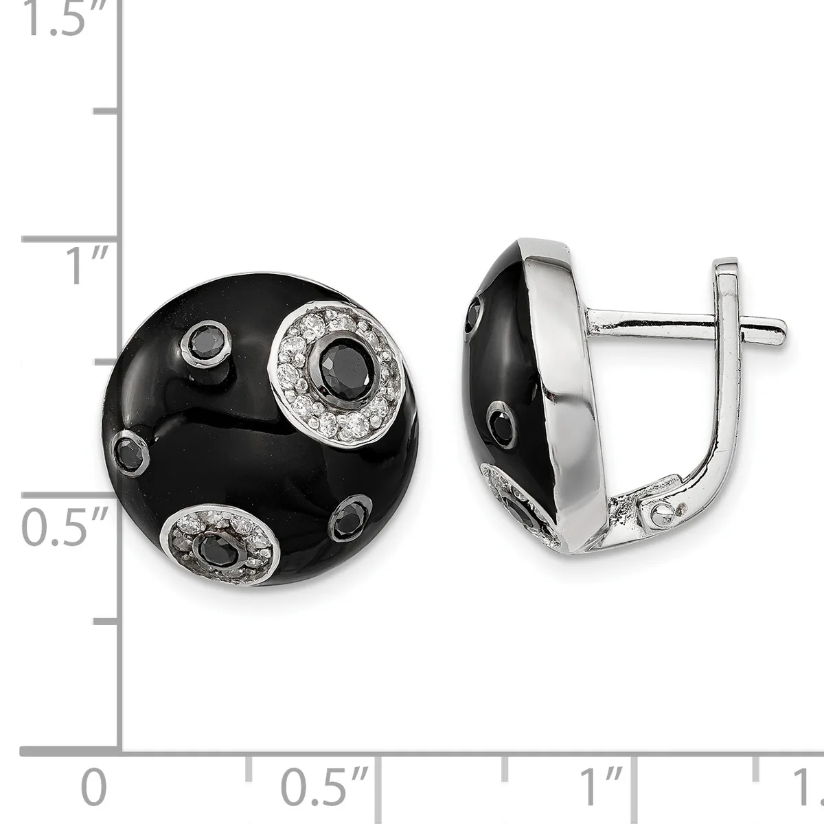 A pair of black onyx and silver earrings with diamond accents, shown from front and side views next to a measurement ruler indicating approximately one inch in diameter.