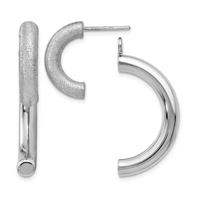 Three silver earrings displayed against a white background: a textured cylindrical stud, a curved C-shaped stud, and a polished curved hoop with post and backing.
