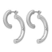 A pair of silver-toned hoop earrings with textured curved tops and polished curved bottoms, shown from the front.