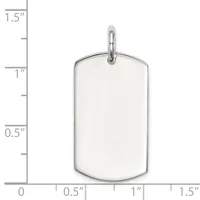 A polished stainless steel dog tag pendant with rounded rectangular shape and a small loop attachment at the top, shown next to a measurement scale.